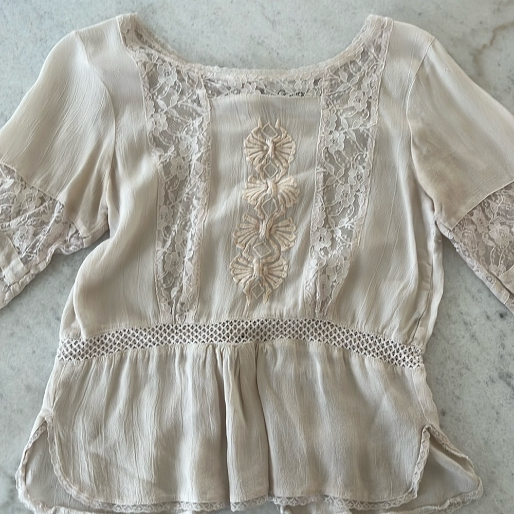 Blush colored blouse by Ganni